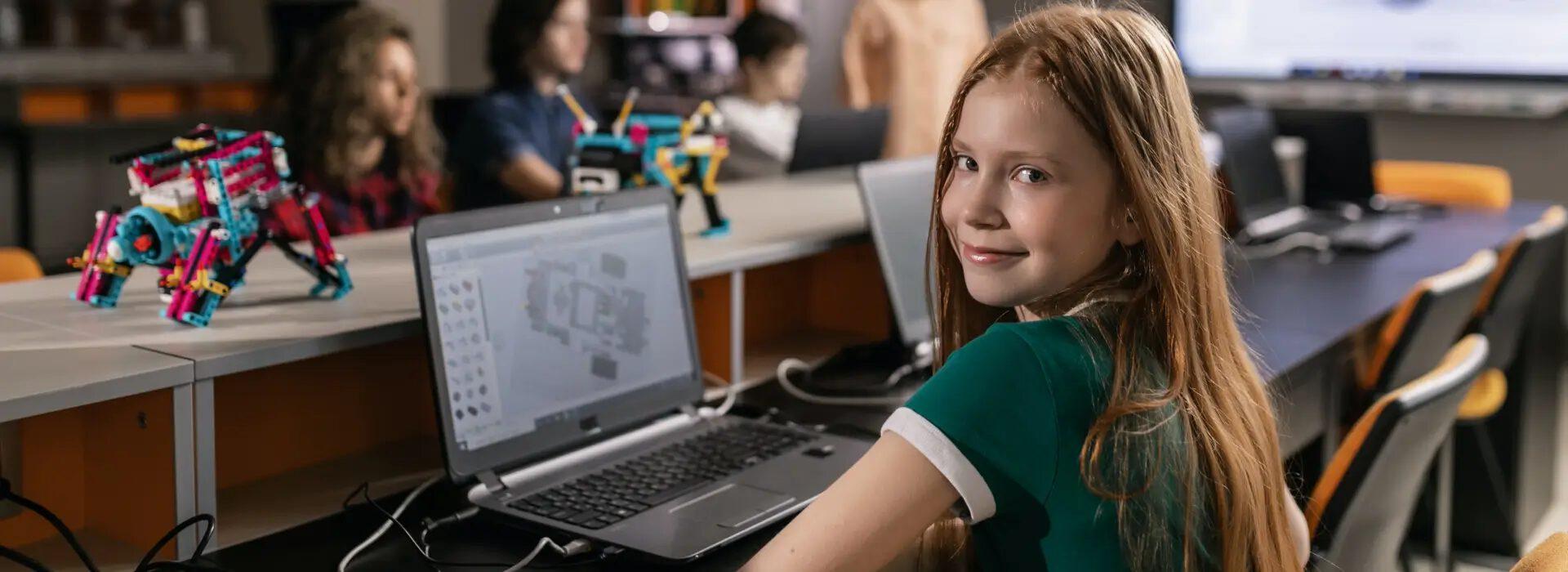 An instructor guiding a student through a coding activity